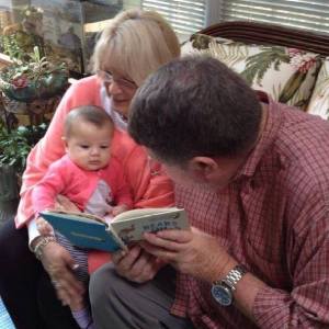 Joel and Vickie spending time with their young granddaughter