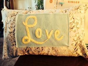 Hand embroidered pillow made for a craft show